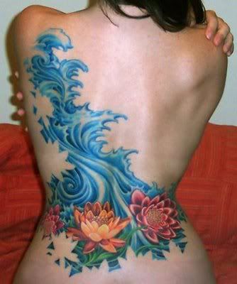 waves-and-flowers-lower-back-tattoo.jpg Waves and Flowers