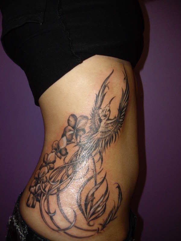 Phoenix-and-Orchid-Rib-Tattoo-