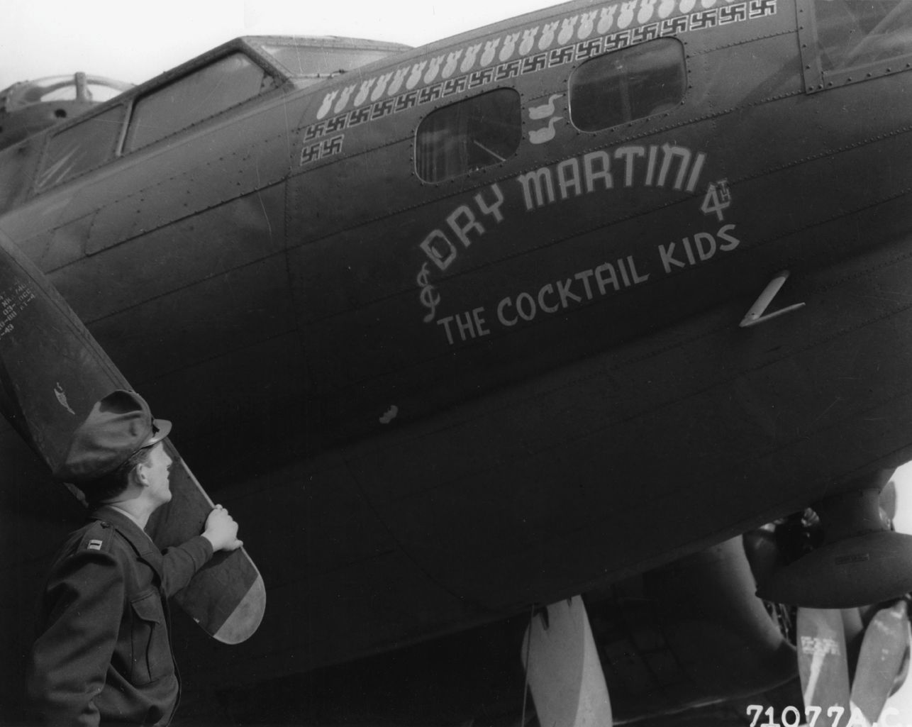 http://i262.photobucket.com/albums/ii120/Duggy009/Duggy009-1/Boeing%20B-17%20Dry%20Martini%204th%20The%20Cocktail%20Kids%20of%20the%20305th%20Bomb%20Group%20based%20in%20England%20.%2020%20May%201943..jpg